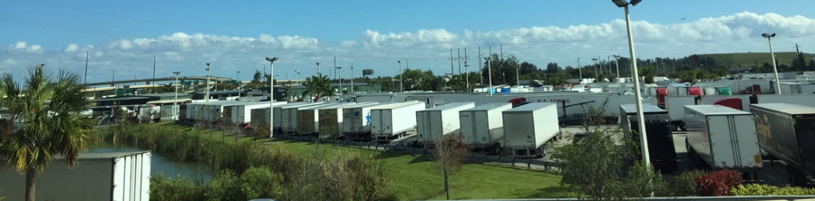 A full truck parking lot – the Florida 595 Truck Stop near I-595 and Florida’s Turnpike – mid-afternoon on a weekday